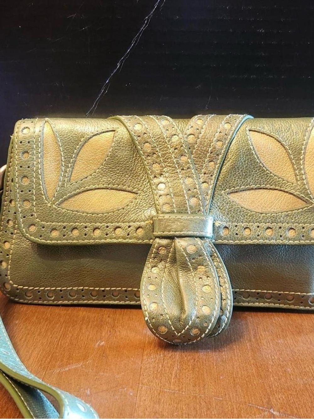 Isabella Fiore Metallic Olive Green Leather Clutch with Floral Cutouts